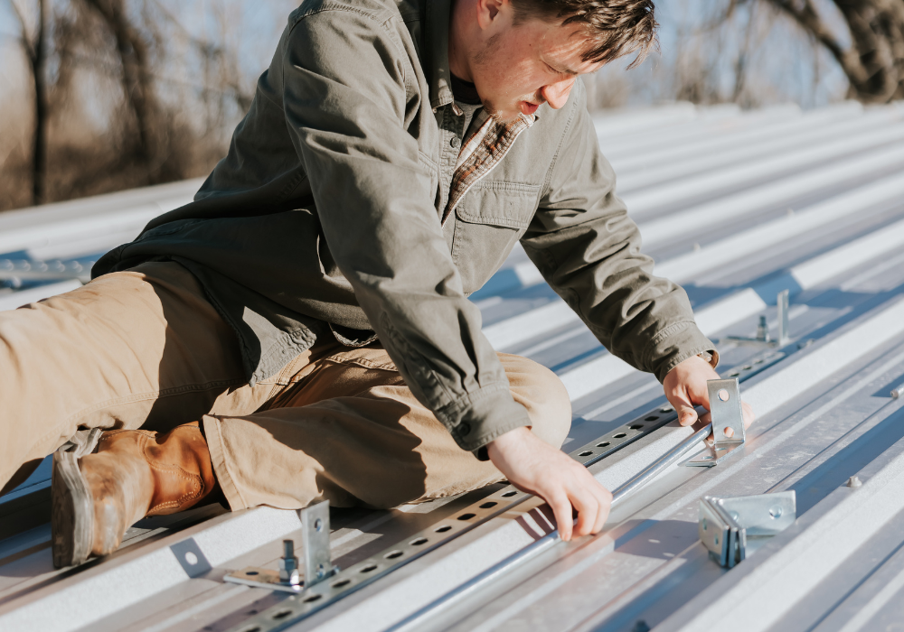hvac technician working on roof